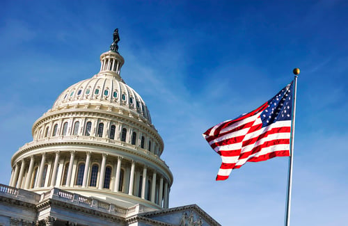 flag next to the capital building